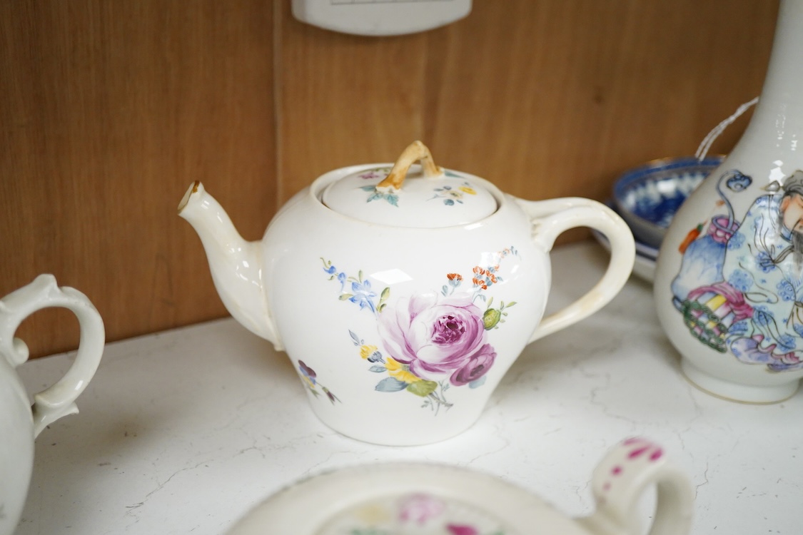An 18th Furstenburg porcelain teapot and cover, a Wallendorf porcelain teapot and cover and a Meissen style teapot, 12cm high